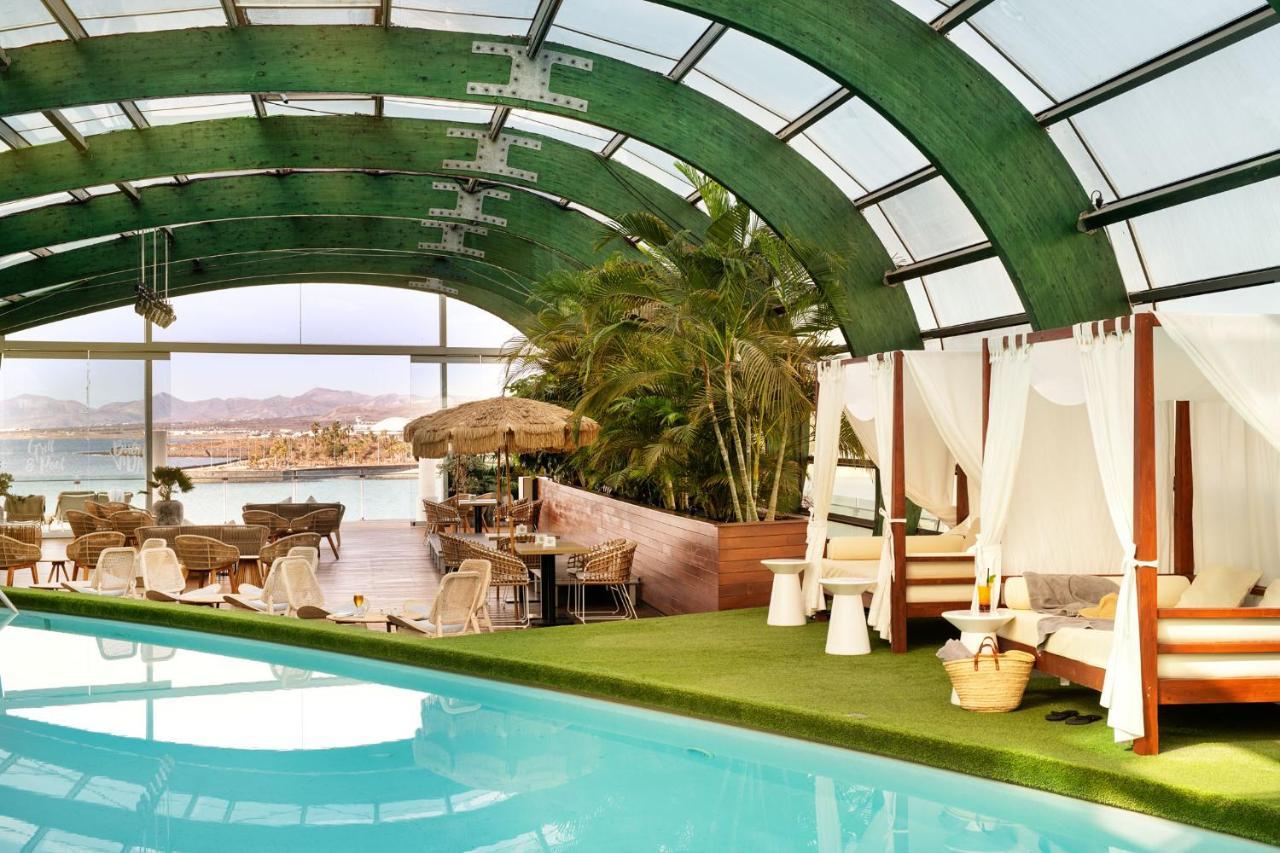 Arrecife Gran Hotel & Spa Exterior foto The pool at the St. Regis Hotel, Aqaba